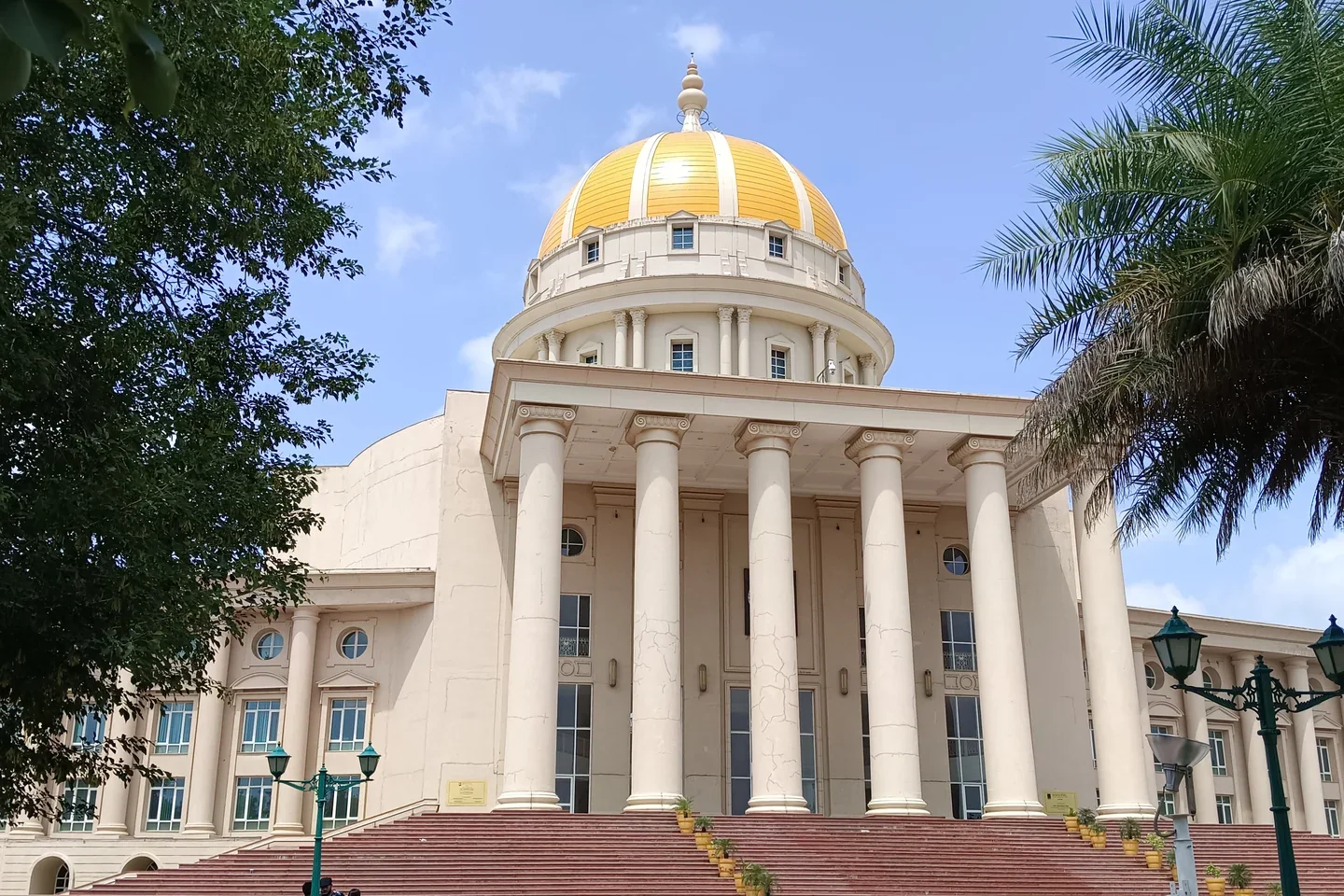 Golden dome and columned academic building at Manipal University Jaipur