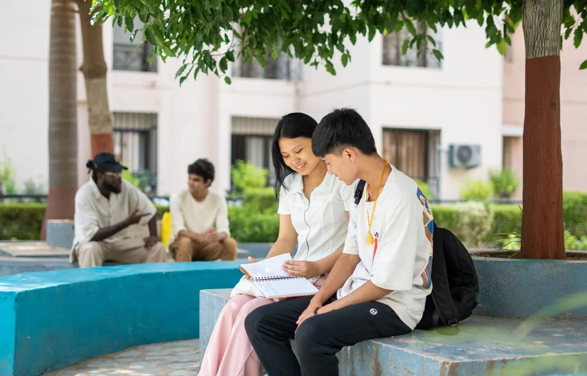 Students studying outdoors at Parul University