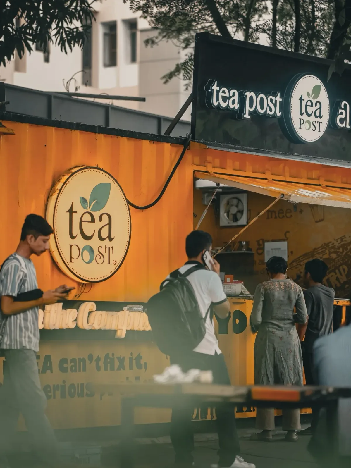 Students at the campus Tea Post
